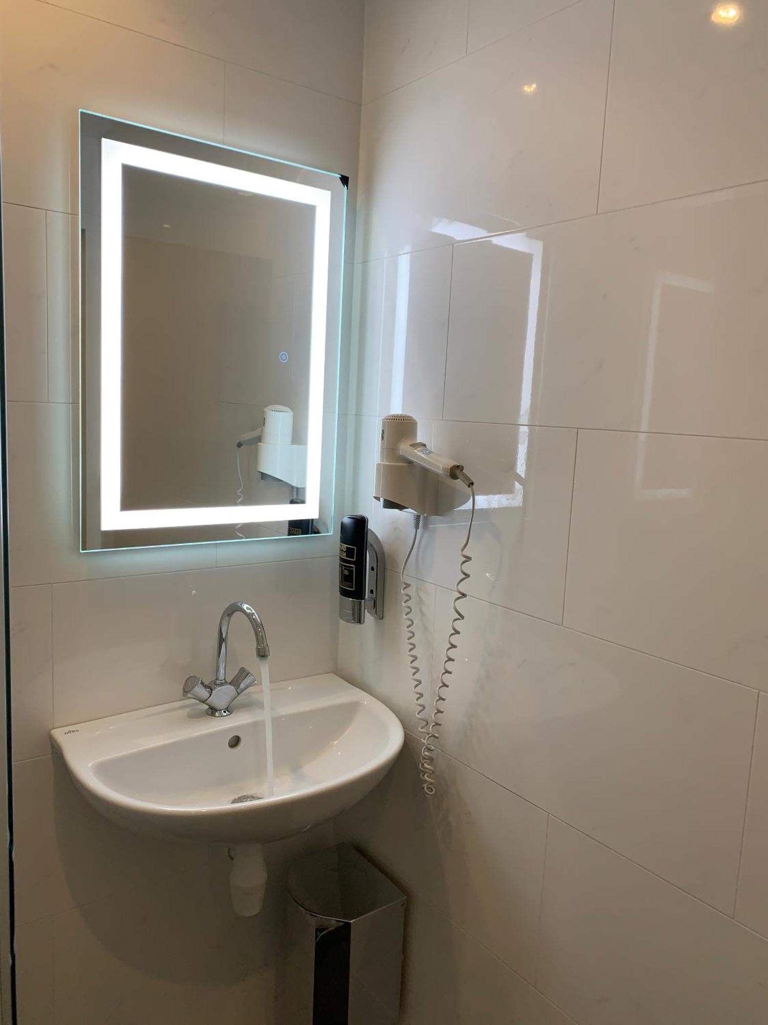Dam Hotel Amsterdam Bagian luar foto